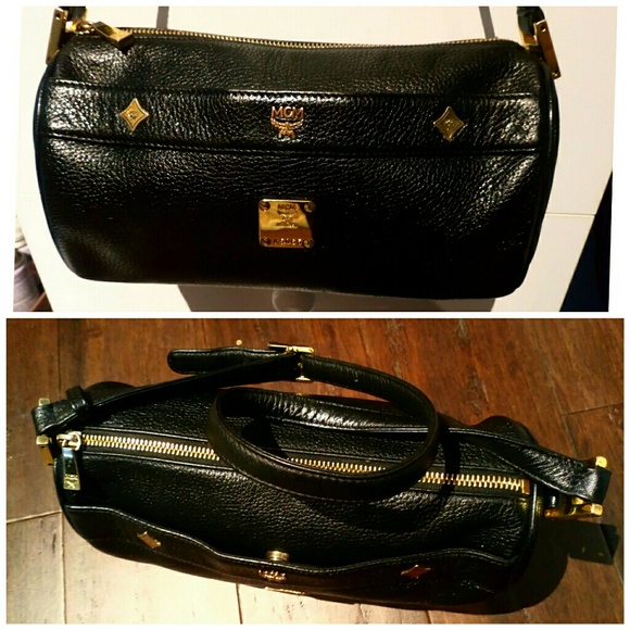 MCM Handbags - "hold for cup 52" Auth. Black MCM calfskin   purse